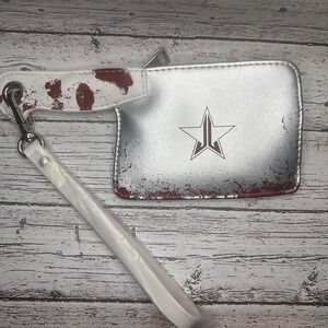 Jeffrey Star limited edition Silver and red makeup cleaver makeup bag